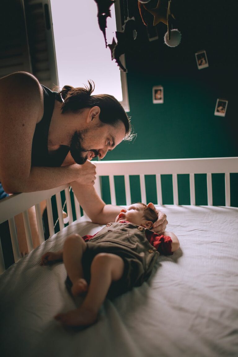 father looking at his baby